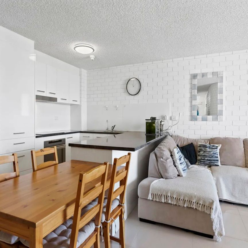 Beachside Living on Alexandra Parade — Neat, Modern & Perfectly Positioned - Photo 1