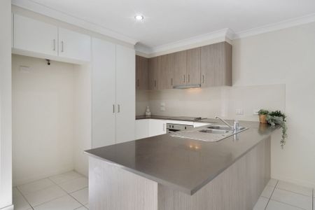Stunning Four Bedroom +Media Family Abode Located In Yarrabilba - Photo 4