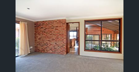 Spacious 4-Bedroom Home in a Quiet North Hill Location - Photo 3