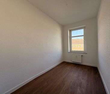 Erstbezug! schicke 4 Raumwohnung mit großem Südbalkon! - Foto 2