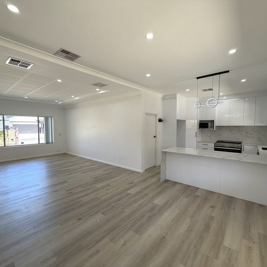 Stylish Fully Renovated Family Home with Rumpus Room! - Photo 1