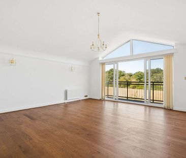 A top floor two double bedroom apartment located within a gated dev... - Photo 1
