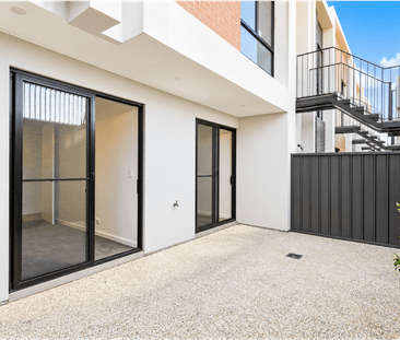 Modern Townhouse Living with Balcony Views in Woodforde - Photo 6