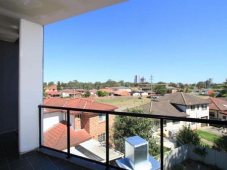 Enjoy Open-Plan Living and Peaceful Views from Your New 2-Bedroom Apartment! - Photo 4