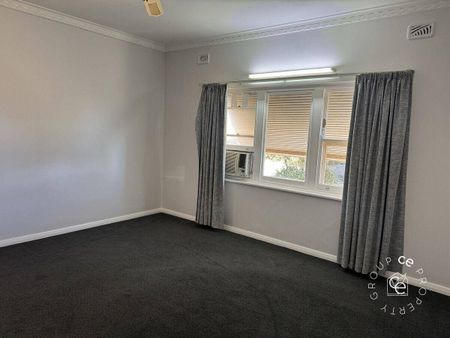 Character Bungalow with Ample Shedding - Photo 4