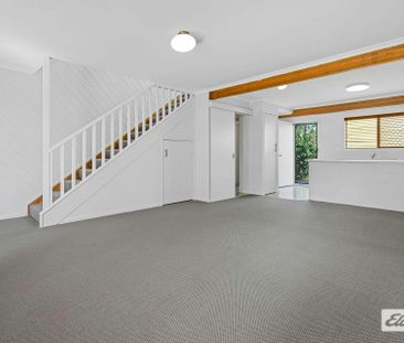 Fresh, Bright & Walk-to-Everything Convenience! - Photo 1