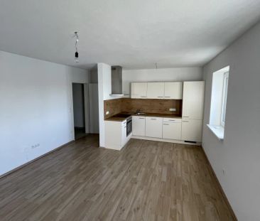 Gelegenheit: Neuwertige, helle 2-Zimmer-Wohnung mit möblierter Küch... - Photo 5