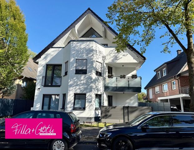 Modernes Wohnen in zentraler Lage – Erdgeschosswohnung mit Gartenanteil! - Photo 1
