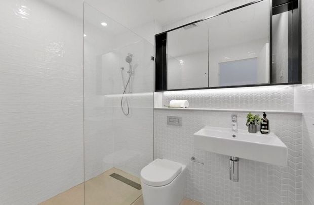 Premium Waterfront Living with Study Nook & Balcony | Rozelle Building, Majors Bay - Photo 1