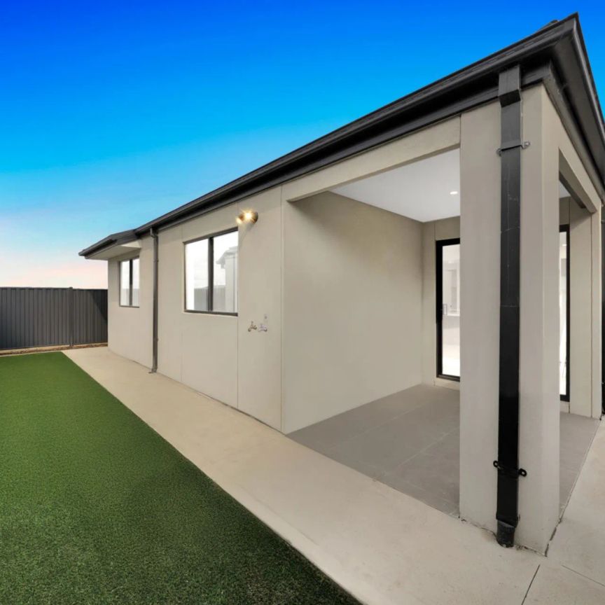 BRAND NEW LIGHT FILLED FAMILY HOME IN BEVERIDGE - Photo 1