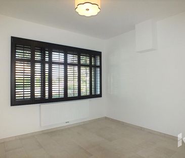 Gelijkvloerse verd. + tuin te huur - Photo 2