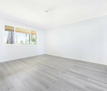 Spacious 4-Bedroom Family Home with Modern Upgrades - Photo 4