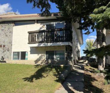 Private back unit, expansive city view | 2 - 7536 Hunterview Drive ... - Photo 1