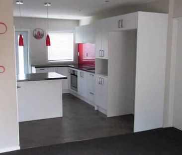 Sunny Two-Level Unit with Private Courtyard - Photo 3