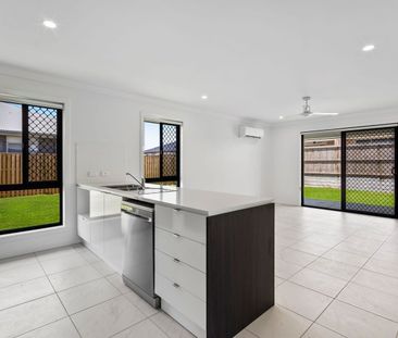 Your Brand New Family Home + Big Backyard! - Photo 6