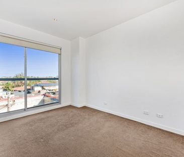 LIGHT, BRIGHT AND IN THE MCKINNON SECONDARY COLLEGE ZONE - Photo 3