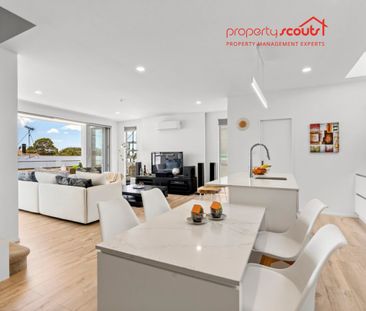 Spacious Designer Home with Flexible Living Across Three Levels - Photo 2