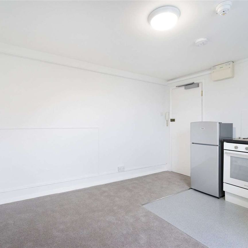 A fourth floor studio apartment situated on Cranley Place, a quiet residential street in South Kensington - Photo 1