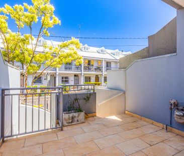 Designer townhome in a connected village setting - Photo 1