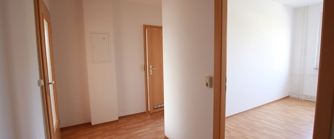 Geräumige 3-Raum-Wohnung mit Balkon und Hauswirtschaftsraum - Foto 1