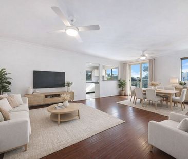 Sunlit Top Floor Coastal Retreat with Ocean Views - Photo 1