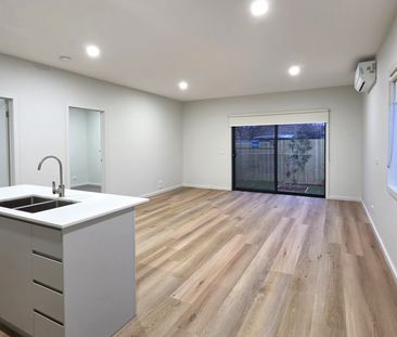 Luxury, Low-Maintenance Living in a Stylish New Townhouse - Photo 1