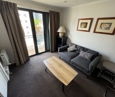 Cozy 1-Bedroom Studio with Covered Garage parking - Photo 2