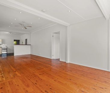 Conveniently Located Cottage with Captivating Water Views - Photo 5