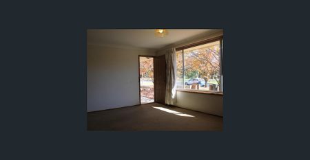 Tidy Two-Bedroom Unit in Peaceful Location - Photo 3