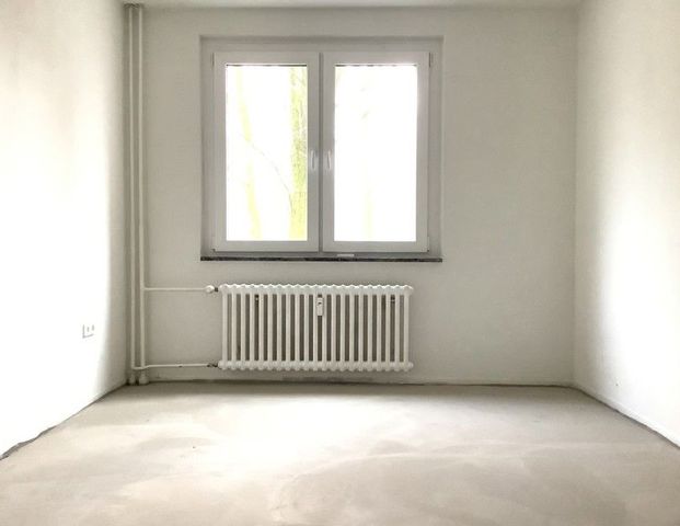 Etwas besonderes: Gemütliche 3-Zimmer-Wohnung mit Balkon und saniertem Bad. - Photo 1