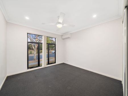 MODERN HOME WITH MULTIPLE LIVING AREAS + SOLAR - Photo 5