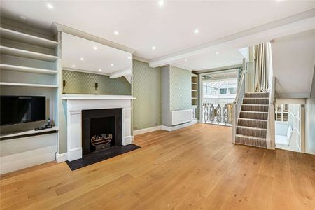 A beautifully presented terraced house situated in the heart of Belgravia. - Photo 2