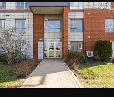 1425 Boul. Le Corbusier - Photo 3