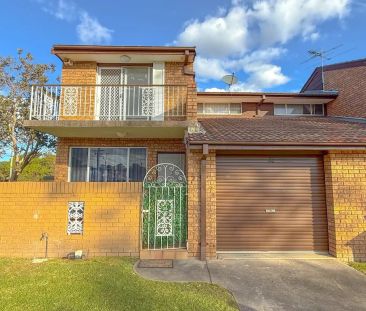 2-Bedroom Townhouse with Lock-Up Garage - Photo 6