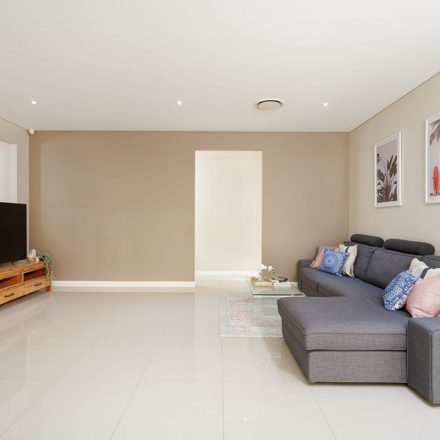 Stylish & Fully Furnished 4-Bedroom Home + Study | 2 Living Areas | Walk to Metro & Shops - Photo 1