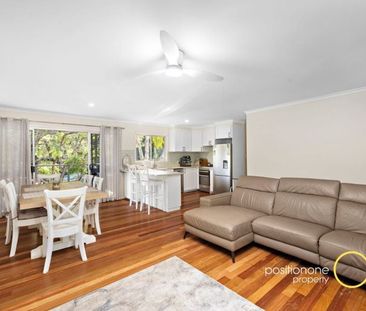 Renovated Family home backing onto peaceful bushlands! - Photo 1