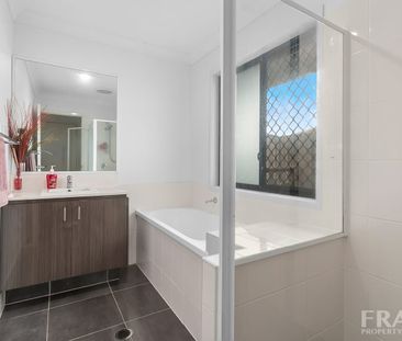 MODERN FAMILY HOME with walking distance to 2 schools! - Photo 1