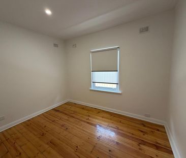 BEAUTIFULLY UPDATED THREE BEDROOM HOME IN HIGHLY SOUGHT AFTER SCHOO... - Photo 5