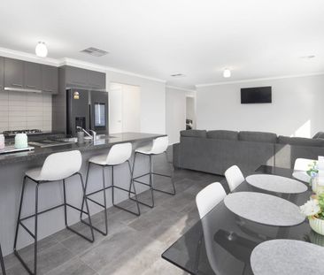 Stunning Family Home with Modern Features in Miners Rest - Photo 4