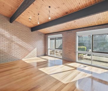 Renovated Comfort with Multiple Living Zones for the Family - Photo 3