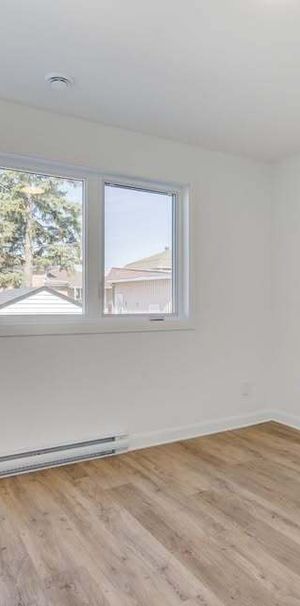 5½ Située Au Rez-de-chaussée - Photo 1