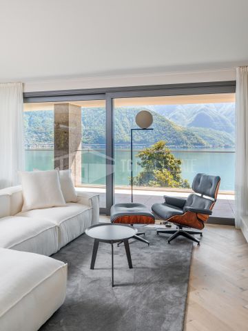 ELEGANZA VISTA LAGO : ATTICO CON TERRAZZA PANORAMICA A MELIDE - Foto 3