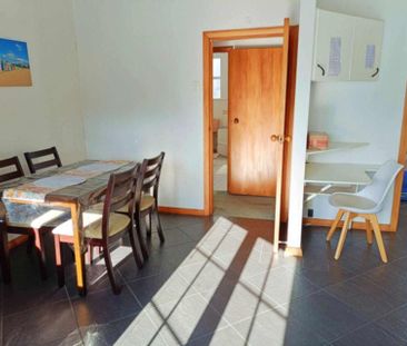 Sunny and Spacious 4-Bedroom, 2-Bathroom Home - Photo 3