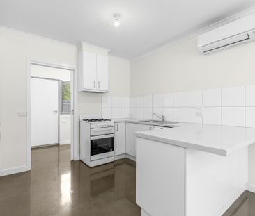 Modern Comfort & Convenience - Secure Two Bedroom Unit - Photo 2