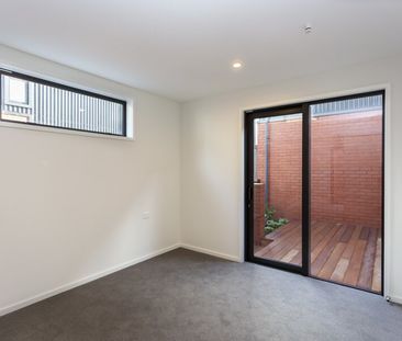 NEAR NEW spacious 2 bedroom townhouse in the city! - Photo 1