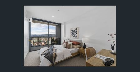 Unfurnished Two-Bedroom Apartment with City-to-Hills Views - Photo 3