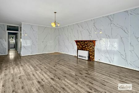 THREE-BEDROOM HOME WITH GARAGE - Photo 2