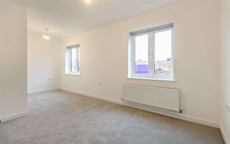 A four bedroom detached family home with a garage and garden - Photo 2