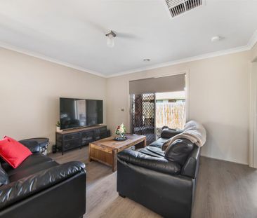 FAMILY HOME IN EXTREME PROXIMITY TO TRAIN STATION! - Photo 1