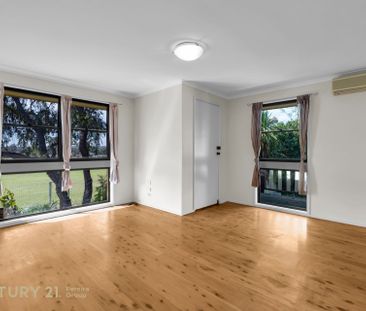 Charming Three-Bedroom Home - Photo 2